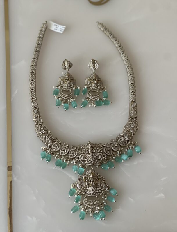 antique silver lakshmi temple necklace set with aqua green beads